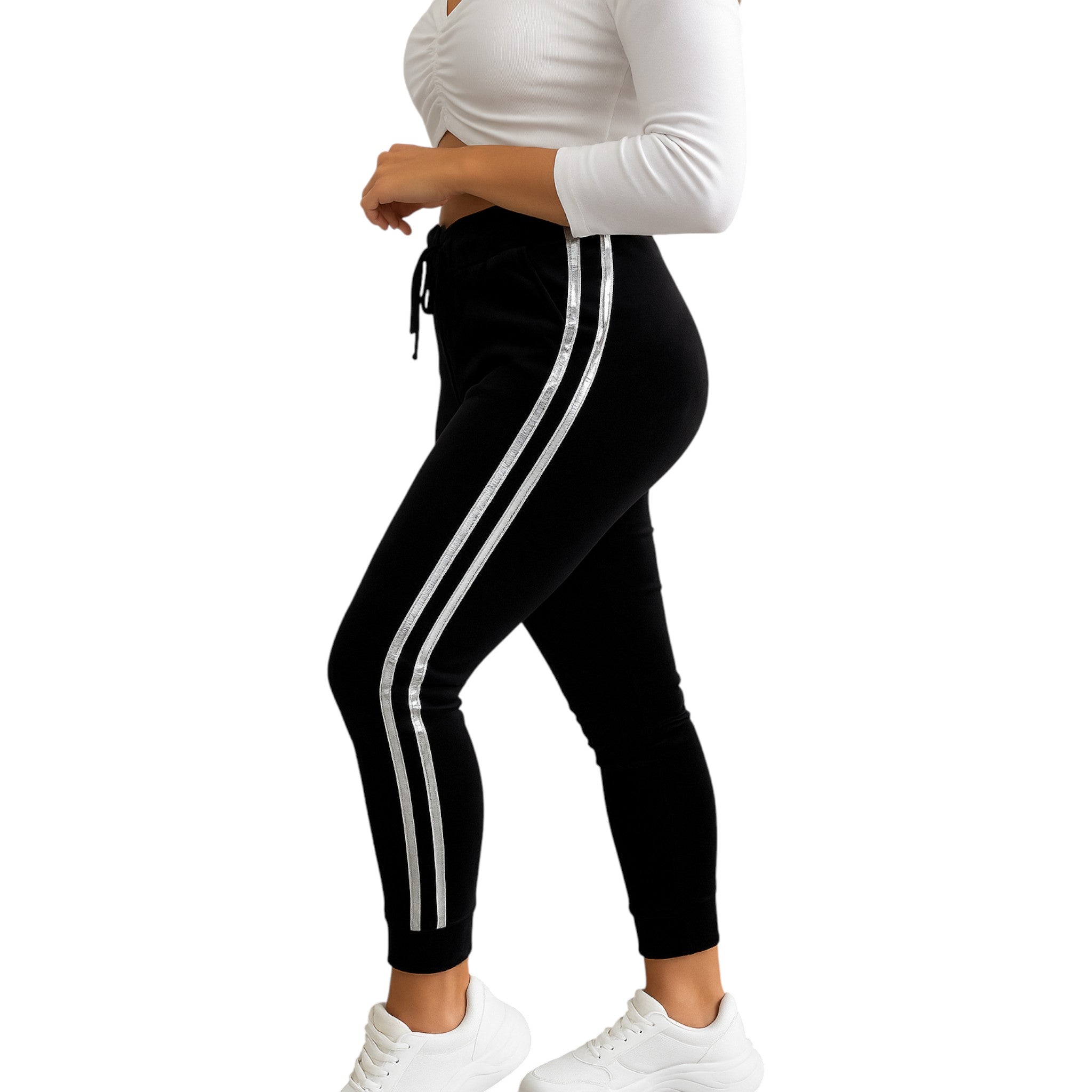 Women’s black joggers with silver double side stripes and cuffed ankles, slim fit high waisted design.